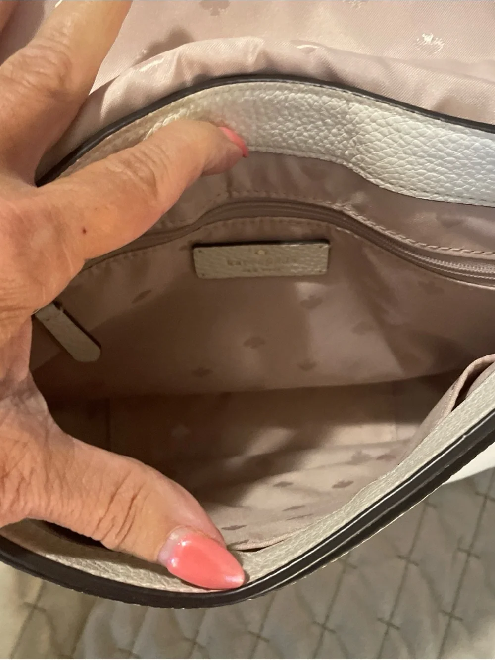 kate spade cream pebbled leather crossbody with gold logo